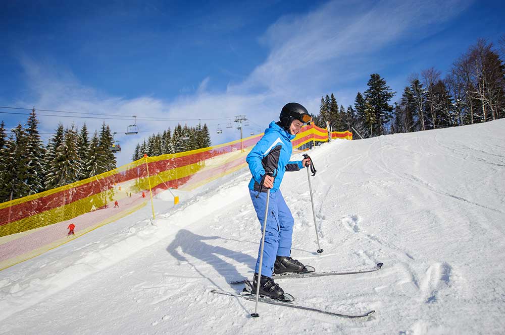 happy-young-female-skier-learning-to-ski-2025-01-16-23-13-15-utc.jpg