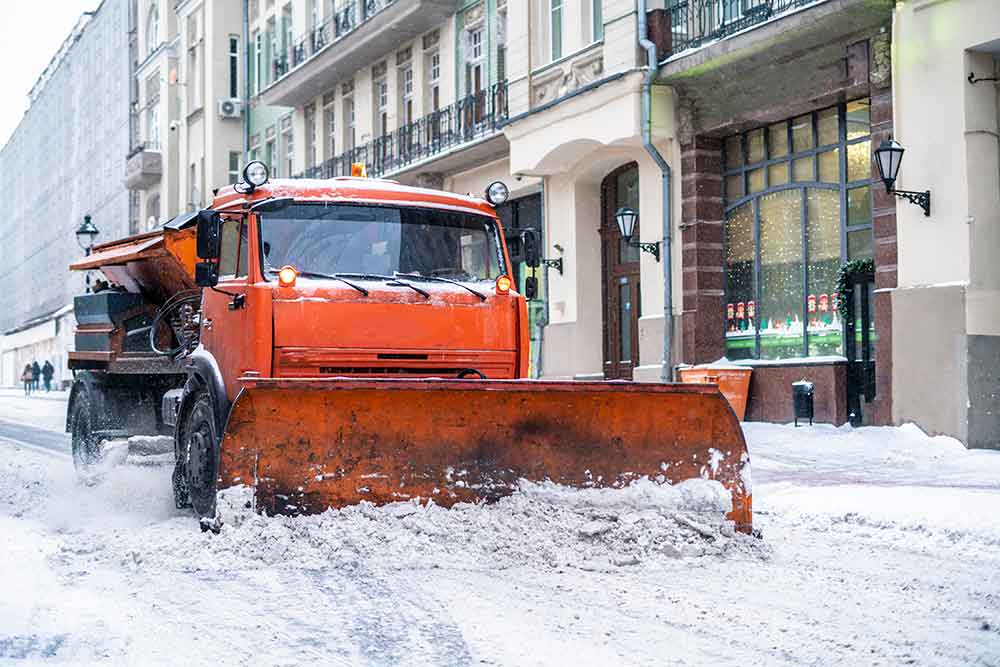 snow-remove-machine-with-crew-in-the-streets-b-2024-09-12-18-44-47-utc.jpg