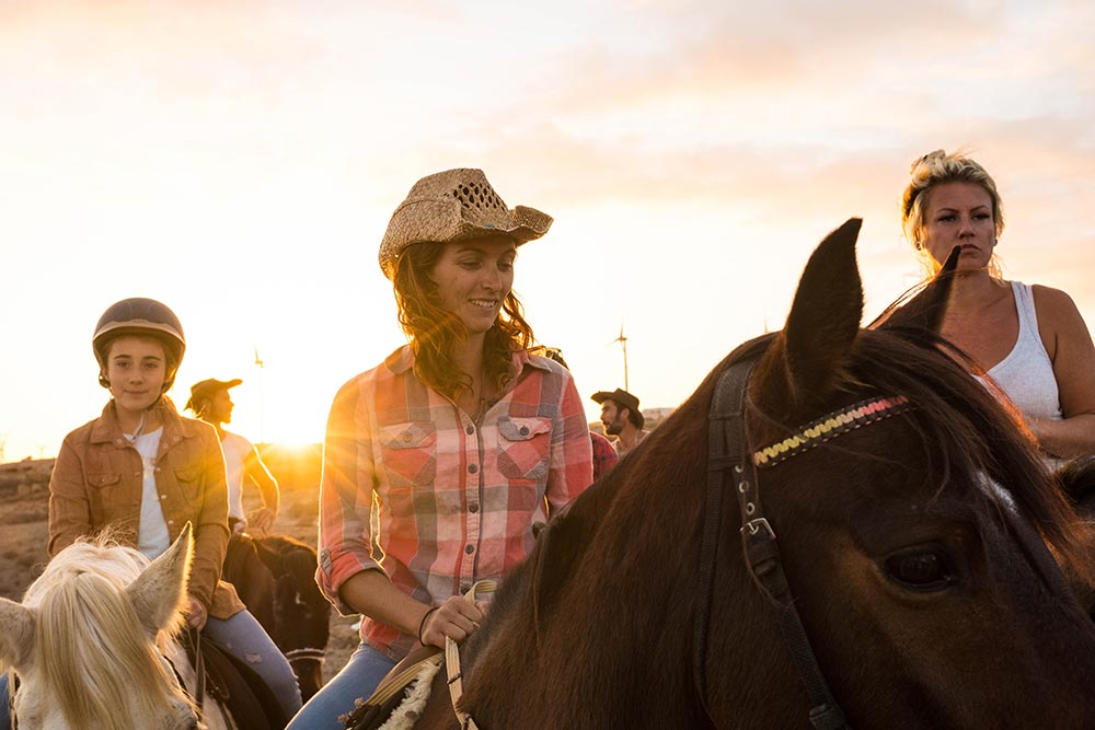 group-of-people-riding-on-a-horses-together-having-2025-03-10-01-05-04-utc.jpg