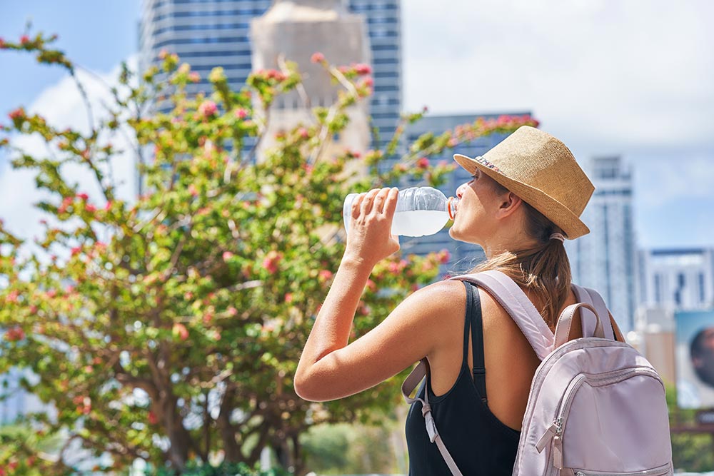 picture-from-miami-of-woman-drinking-water-in-warm-2025-01-08-06-14-46-utc.jpg