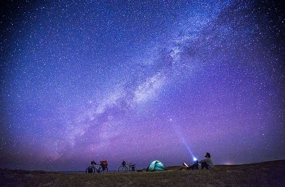 people-watching-starry-sky-while-camping-2023-11-27-05-24-45-utc.jpg