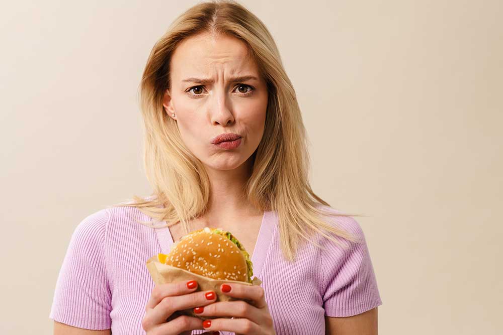 unhappy-beautiful-blonde-girl-posing-with-hamburge-2025-02-16-18-23-05-utc.jpg