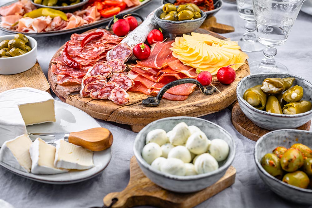 assorted-appetizers-and-antipasti-platters-on-wood-2025-05-29-18-34-30-utc.jpg