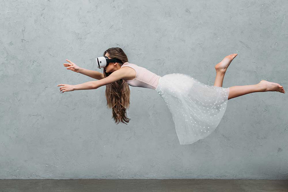 young-barefoot-woman-in-virtual-reality-headset-le-2024-11-18-05-28-29-utc.jpg