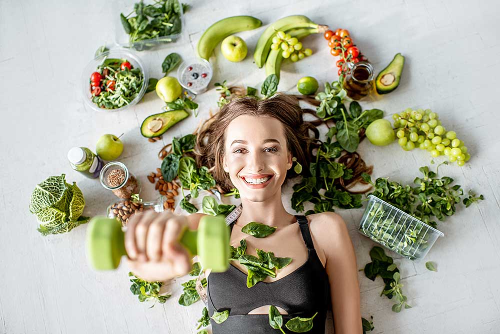 portrait-of-a-sports-woman-with-healthy-food-2025-03-13-02-47-35-utc.jpg