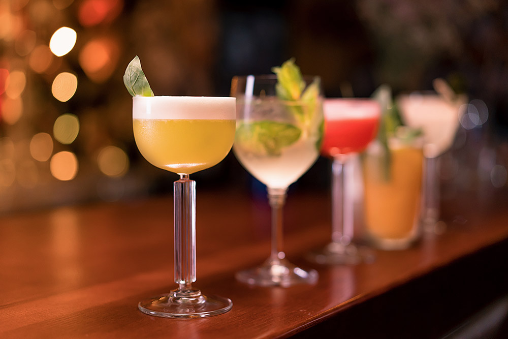 close-up-of-cocktails-of-different-colors-in-diffe-2024-11-27-10-44-35-utc.jpg