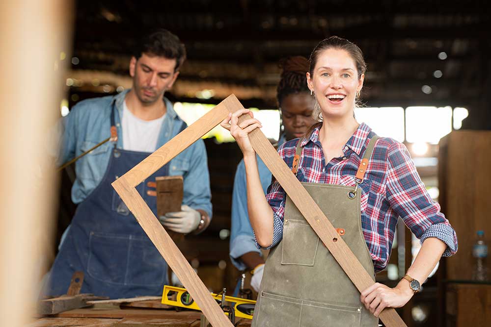 portrait-of-carpenter-female-worker-standing-in-fr-2025-01-08-02-51-47-utc.jpg