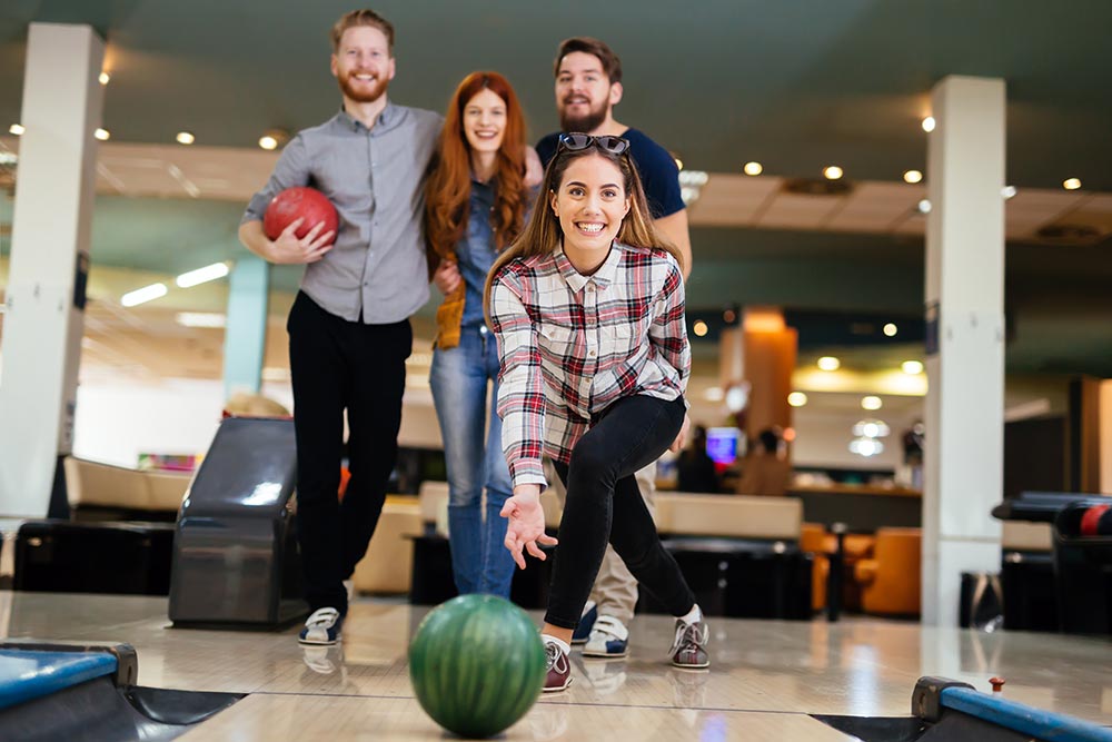 cheerful-friends-bowling-together-and-having-fun-2025-03-13-03-46-35-utc.jpg